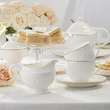zestaw do kawy z białej porcelany ze złotą linią