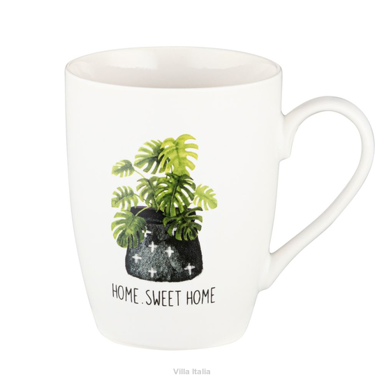 Kubek do kawy z roślinną dekoracją