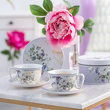 Filiżanki porcelanowe w kwiaty w pudełkach ozdobnych