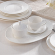 ekskluzywna filiżanka z cukiernicą na półmisku porcelanowa