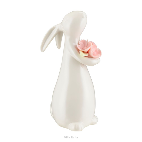 zajączek wielkanocny z kwiatuszkami w łapkach wykonany z porcelany