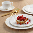Zastawa porcelanowa ze złotym wzorem
