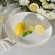 Półmisek porcelanowy owalny zdobiony tłoczonym wzorem, z góry