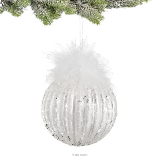 szklana bombka z piórami