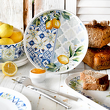 Zastawa porcelanowa z niebieskim wzorem i motywem cytryn