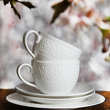 Filiżanki porcelanowe z tłoczonym ornamentem
