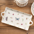 elegancki półmisek porcelanowy do serwowania ciasta ze wzorem motyli i kwiatów