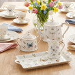 elegancka zastawa kawowa z kremowej porcelany