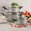 Trzy solidne garnki aluminiowe ze szklanymi przykrywkami