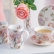Seria kubków i filiżanek porcelanowych w kwiaty na prezent
