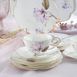filiżanka ze spodkiem z kwiatowym wzorem porcelanowa