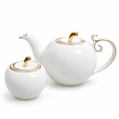 Elegancki komplet porcelanowy składający się z czajnika oraz dopasowanej cukiernicy.