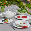 Serwis obiadowy porcelanowy na ogrodowym stole
